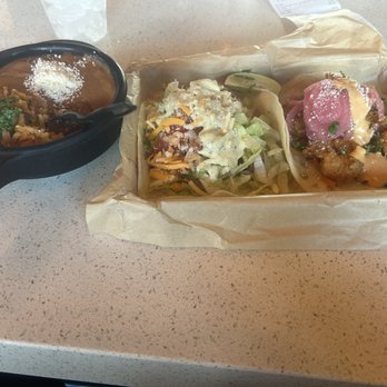 Torchy's Tacos - Rice and beans, fried chicken tender taco, fried shrimp taco. - Tacos Near Me - Houston, Texas