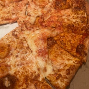 Luciano's Pizza - Cheese pizza.  I like this place but was a little disappointed when large spots of no cheese on the pizza.  . - Pizza Near Me - Cape Coral, Florida
