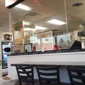 Skuddlebutts Pizza & Catering - Area where pizza order is placed and made. - American Near Me - Downers Grove, Illinois Skuddlebutts Pizza & Catering - Area where pizza order is placed and made. - American Near Me - Downers Grove, Illinois