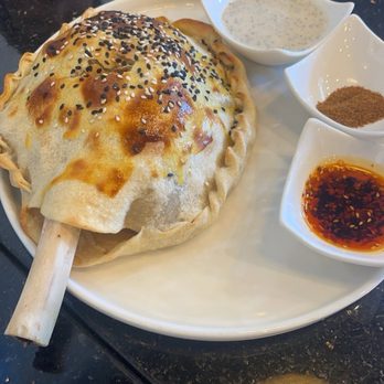 Kusan Bazaar | Silk Road Grill & Noodles 龟兹集市 - Wellington-Style Roasted Lamb Shank - Halal Near Me - Milpitas, California