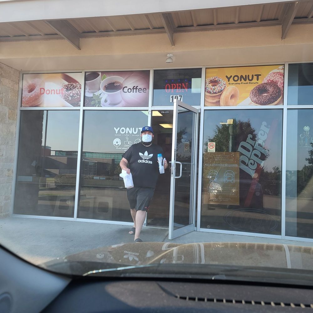 Family Donuts - a man entering a donut shop - Donuts Near Me - Plano, Texas