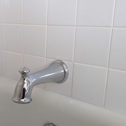 The Tile Solution - After photo 2. Bruce sourced the non-standard sized tiles to match the vintage tiles on the adjacent wall.