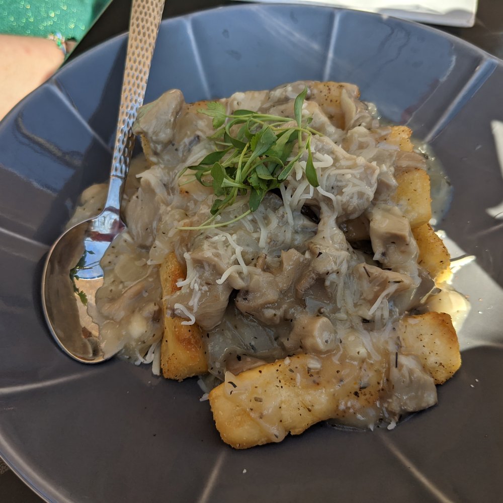 The Nomad - Fried yuca poutine - Tapas/Small Plates Near Me - Hillsborough, North Carolina The Nomad - Fried yuca poutine - Tapas/Small Plates Near Me - Hillsborough, North Carolina