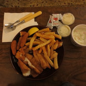 Showmars - Fish and Chips - flounder, crinkle cut fries, some hushpuppies, coleslaw, tartar sauce, and ketchup packets. - Southern Near Me - Durham, North Carolina Showmars - Fish and Chips - flounder, crinkle cut fries, some hushpuppies, coleslaw, tartar sauce, and ketchup packets. - Southern Near Me - Durham, North Carolina