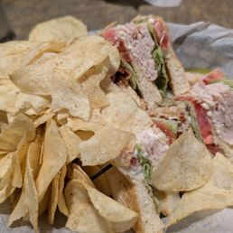 Turkey club sandwich with chips. Very good.