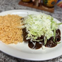 Taqueria El Viejon - Chicken enmoladas with lettuce, cheese and side of rice