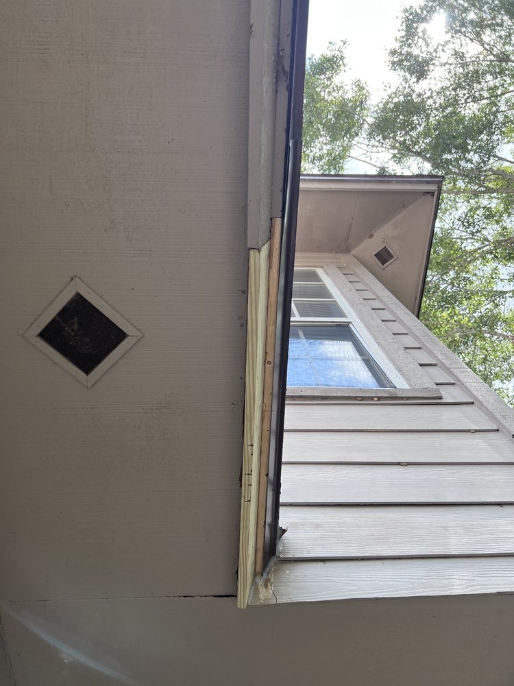 Slide of Big Tuna Roofing