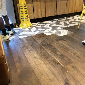 Nando's Peri-Peri - I saw so many people slip and fall here due to a sticky wet floor - Portuguese Near Me - Chicago, Illinois