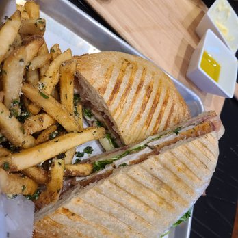 Sicily Coal Fired Pizza - Crispy chicken panini with bacon, onion jam, provolone, arugula, and roasted garlic aioli, side of truffle parm fries. - Pizza Near Me - Middletown, Connecticut Sicily Coal Fired Pizza - Crispy chicken panini with bacon, onion jam, provolone, arugula, and roasted garlic aioli, side of truffle parm fries. - Pizza Near Me - Middletown, Connecticut