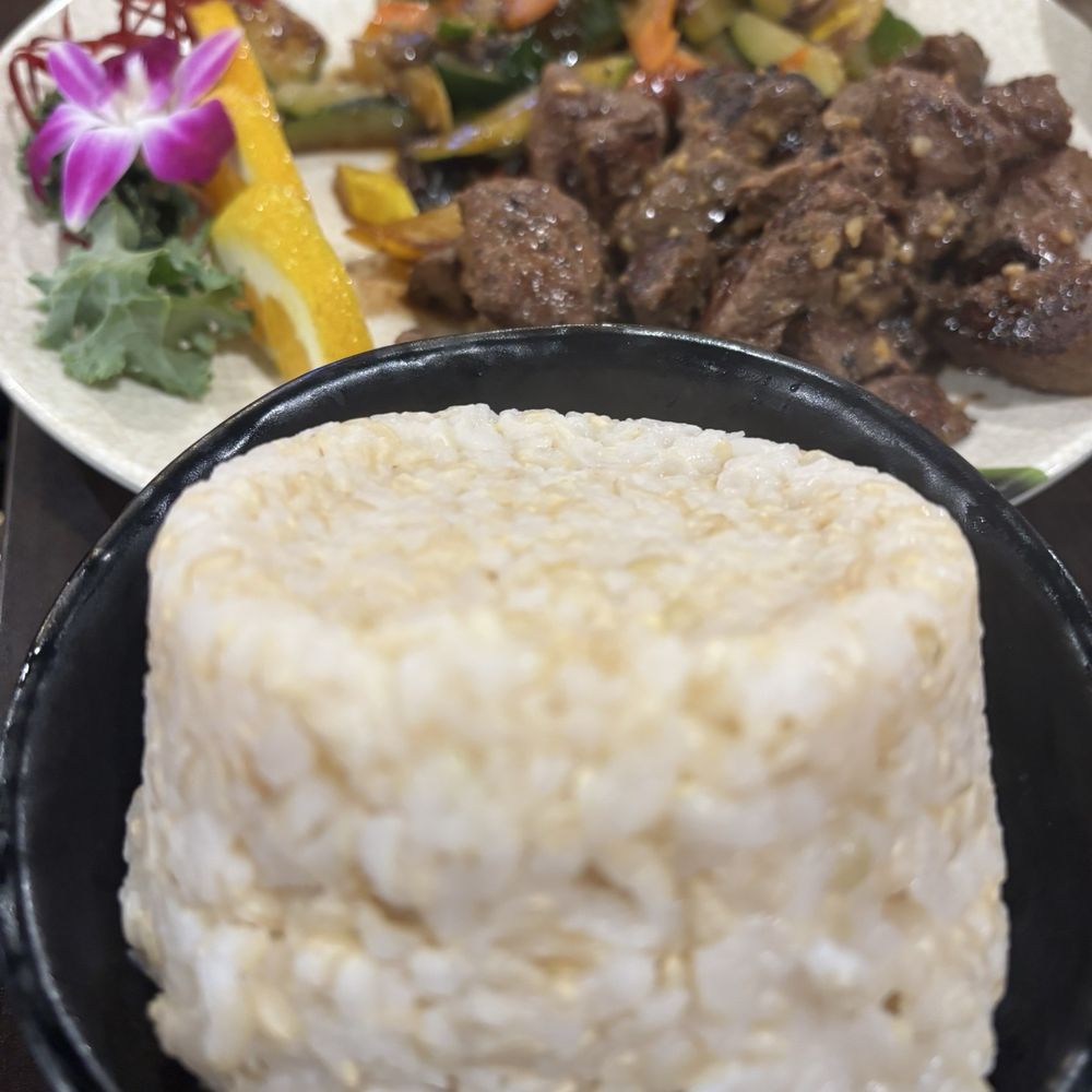 Sushi Yama - Brown Rice (Hibachi Steak in background) - Sushi Bars Near Me - Orlando, Florida Sushi Yama - Brown Rice (Hibachi Steak in background) - Sushi Bars Near Me - Orlando, Florida