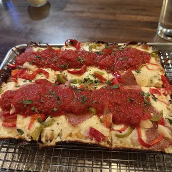 Black Cat Pizza - Hawaiian style pizza 10/10!!! Also get the broccolini best I've ever had - Pizza Near Me - Palm Desert, California