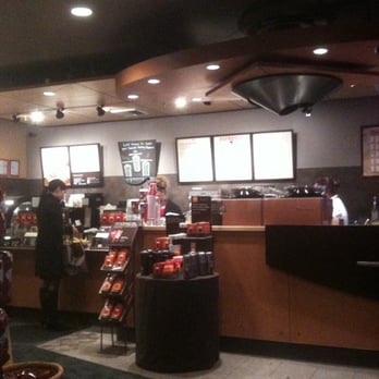 Starbucks - a coffee shop with customers in the background - Coffee & Tea Near Me - Calgary, Alberta Starbucks - a coffee shop with customers in the background - Coffee & Tea Near Me - Calgary, Alberta