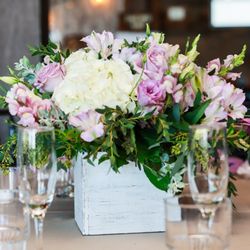 La Belle Orange Blossom Florist - Centerpieces, including Ocean Song roses.