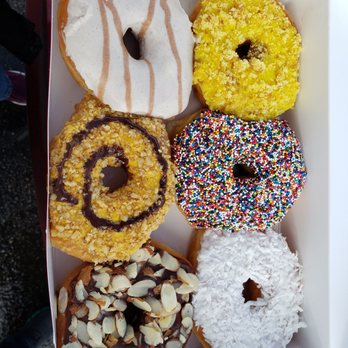 Amy's Donuts - A selection of their donuts, including coconut, horchata, sprinkle, and chocolate with almonds flavors. - Donuts Near Me - Tucson, Arizona Amy's Donuts - A selection of their donuts, including coconut, horchata, sprinkle, and chocolate with almonds flavors. - Donuts Near Me - Tucson, Arizona
