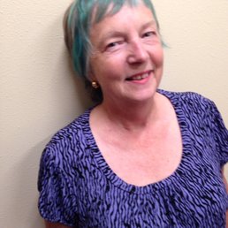 In honor of Ovarian Cancer Awareness Month, Candice design my new haircut with Teal highlights. Thanks for the wonderful service!