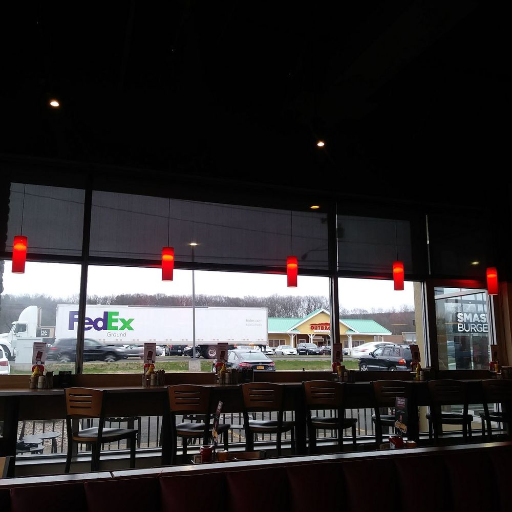 Smashburger - Modern decor inside. They have stools or you can sit at a table. All about preference. - Burgers Near Me - Southington, Connecticut