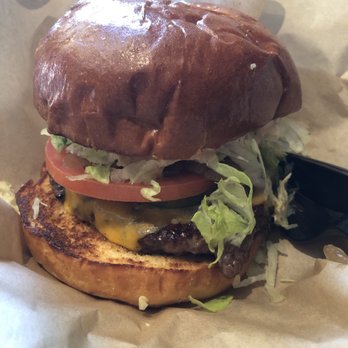 The Stand - American Classics Redefined - Cheeseburger cooked medium with cheddar cheese - New American Near Me - Irvine, California The Stand - American Classics Redefined - Cheeseburger cooked medium with cheddar cheese - New American Near Me - Irvine, California