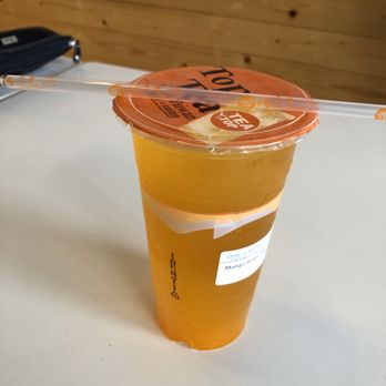 Tea Top - Excelent Mango Tea with sealed cover! - Bubble Tea Near Me - Ellicott City, Maryland Tea Top - Excelent Mango Tea with sealed cover! - Bubble Tea Near Me - Ellicott City, Maryland