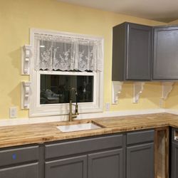 Removed/Added Open Cabinet 
Butcher Block Countertops
Mounted Custom Brackets