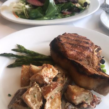 Nick + Stef's Steakhouse - Grilled Pork Chop - Steakhouses Near Me - New York, New York Nick + Stef's Steakhouse - Grilled Pork Chop - Steakhouses Near Me - New York, New York