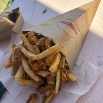 Wine Village in Baltimore - Snackies- these were the cheddar fries. Nothing special but you get ALOT of fries for the cost. - Festivals Near Me - Baltimore, Maryland Wine Village in Baltimore - Snackies- these were the cheddar fries. Nothing special but you get ALOT of fries for the cost. - Festivals Near Me - Baltimore, Maryland