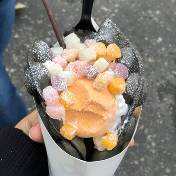 The Moo Bar - Charcoal bubble waffle, Thai tea ice cream, mochi topping. - Desserts Near Me - Seattle, Washington The Moo Bar - Charcoal bubble waffle, Thai tea ice cream, mochi topping. - Desserts Near Me - Seattle, Washington