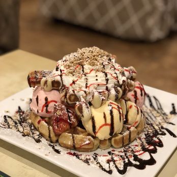 Java & Mug Cafe - Waffle deluxe--waffle topped with vanilla and strawberry ice cream, bananas, strawberry, whipped cream, nuts, and chocolate syrup! - Coffee & Tea Near Me - Chicago, Illinois Java & Mug Cafe - Waffle deluxe--waffle topped with vanilla and strawberry ice cream, bananas, strawberry, whipped cream, nuts, and chocolate syrup! - Coffee & Tea Near Me - Chicago, Illinois