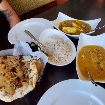 Tulsi - Medium-Hot chicken masala. Medium tofu mango curry. Chili garlic naan. 5 out of 5 - Indian Near Me - Richmond, Virginia Tulsi - Medium-Hot chicken masala. Medium tofu mango curry. Chili garlic naan. 5 out of 5 - Indian Near Me - Richmond, Virginia