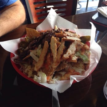 Clasico Kitchen Bar - Super nachos with chicken and arrachera steak - Mexican Near Me - El Paso, Texas