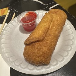 Royal Mandarin Express - Greasy egg roll.  When I bit into mine, a lot of grease came out.  This is my husband's that he never ate.