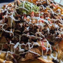 Chicken nachos prepared how I like it. A plate filled is a plate that must be devoured. Chicken nachos prepared how I like it. A plate filled is a plate that must be devoured.
