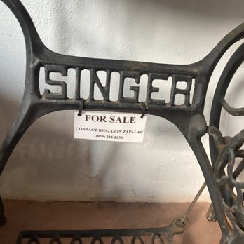 Neon Moon Coffee - They featured a gorgeous Singer sewing table with a custom live edge top from a local artisan. This table is stunning- stop in to see it! - Coffee Roasteries Near Me - Burton, Texas