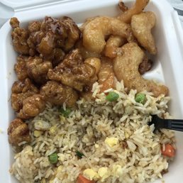 Two plate - fried rice with shrimp and orange chicken Two plate - fried rice with shrimp and orange chicken