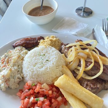 Brasil Bistro - Picanha acebolada especial (Beef Filet, rice, beans, farofa, Vinagrete, cassava, fried banana, potato salad,sautéed onions) - Brazilian Near Me - El Cerrito, California Brasil Bistro - Picanha acebolada especial (Beef Filet, rice, beans, farofa, Vinagrete, cassava, fried banana, potato salad,sautéed onions) - Brazilian Near Me - El Cerrito, California
