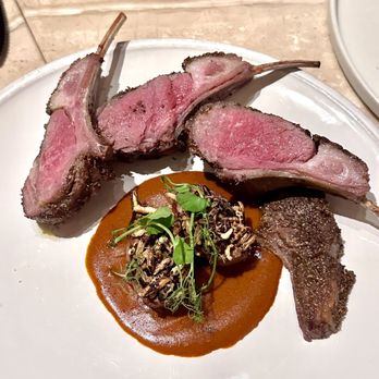 San Laurel - Rack Of Lamb. Roasted baby eggplants w puffed wild rice on a mole. - Spanish Near Me - Los Angeles, California San Laurel - Rack Of Lamb. Roasted baby eggplants w puffed wild rice on a mole. - Spanish Near Me - Los Angeles, California