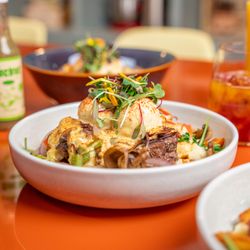 OEB Breakfast - Winnipeg - Artisan cheese curds, Philly-style beef short-rib, bell peppers, red onions, mushrooms
