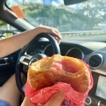 Leonard's Bakery - Guava Malasada ($2.10) - fun vibrant tart filling! - Bakeries Near Me - Honolulu, Hawaii
