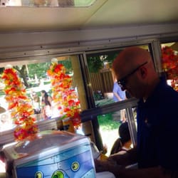 Kona Ice of Redlands - Serving up our happy customers. Johnny at the helm!