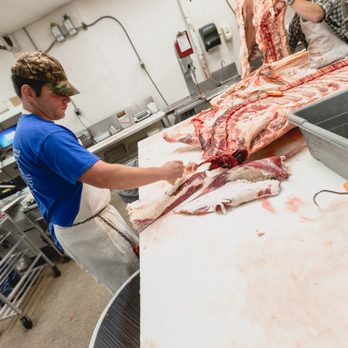 Minden Meat Market - a butcher working in the kitchen - Meat Shops Near Me - Minden, Iowa Minden Meat Market - a butcher working in the kitchen - Meat Shops Near Me - Minden, Iowa