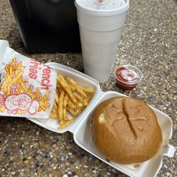 Wow burger with cheese, medium fry, and a chocolate shake. Wow burger with cheese, medium fry, and a chocolate shake.