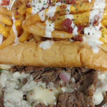 Speedway Eatery - Steak Philly with Loaded Fries - Food Trucks Near Me Speedway Eatery - Steak Philly with Loaded Fries - Food Trucks Near Me