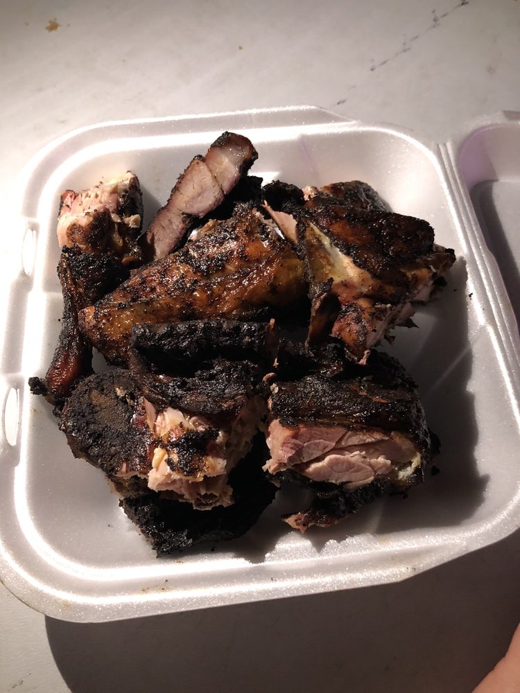 A & A Roadside Bbq & Jerk Center Logo