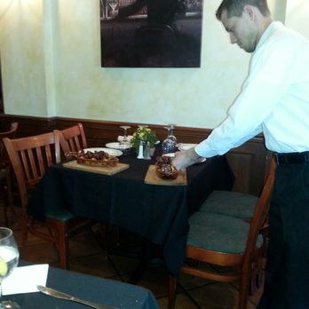 Cafe Sport Restaurant - Preparation of Chorizos - Seafood Near Me - Williston Park, New York Cafe Sport Restaurant - Preparation of Chorizos - Seafood Near Me - Williston Park, New York