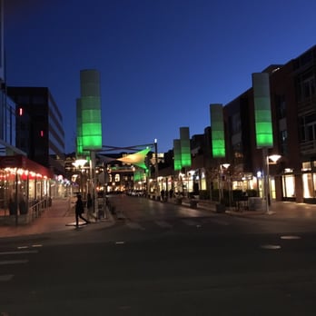 Fillmore Plaza - Light blades on either side of the street with changing colors. - Shopping Centers Near Me - Denver, Colorado
