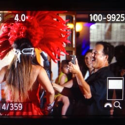 If you need Samba Dancers I highly recommend. Here's a cool shot of hubby being entertained by this amazingly talented group!!! If you need Samba Dancers I highly recommend. Here's a cool shot of hubby being entertained by this amazingly talented group!!!