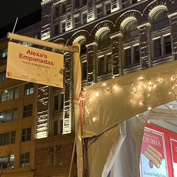 Alexa's Empanadas - a large building with a clock tower in the background - Food Stands Near Me - Washington, DC, District of Columbia