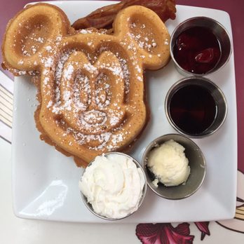 Carnation Cafe - Mickey-shaped waffles. Add $1 for strawberry syrup - American Near Me - Anaheim, California