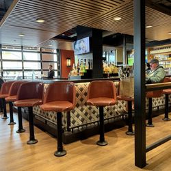 Cactus Restaurants - Proctor - Restaurant booth facing the bar