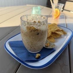 Elote dip (in a water cup???) and a small handful of Chips ($13)