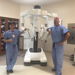 Odessa General Surgery - Dr Lynch and Cody Mygrant, PA-C with da Vinci robot